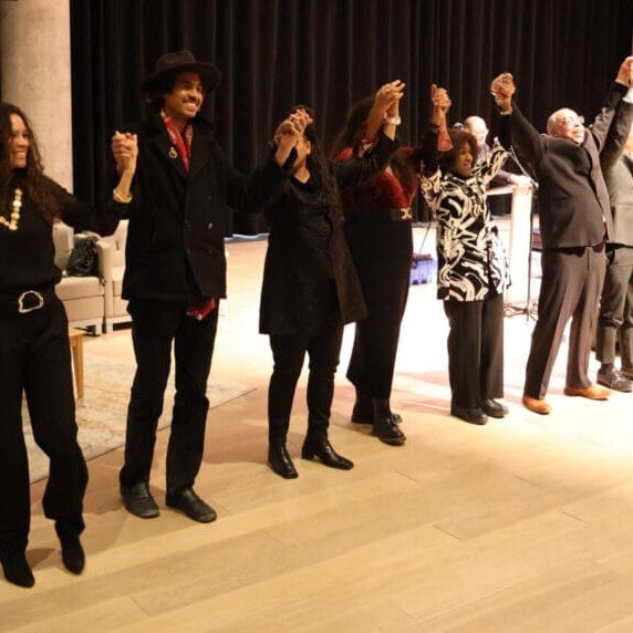 Reed “iZrEAL” Jones, El Jones, Stedmond Pardy, Delvina Bernard, Salima Tourkmani-MacDonald, Dr. Mayann Francis, George Elliot Clarke, D.D. Jackson, Shanice Skinner and Dean Bowman take a bow at the Halifax Central Library on Feb. 8, 2025. The event was held as part of African Heritage Month. Image by V. Patterson.