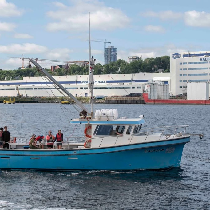 The boat, Eastcom, with Dal researchers on board in the Halifax Harbour in September 2023. (Image courtesy of Dalhousie Ocean-AlkAlign team)