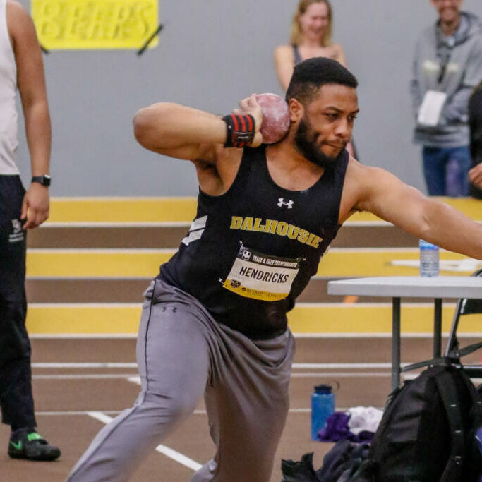 Andre Hendricks shot put (credit Dalhousie Athletics) In this image: Andre Hendricks preparing to throw a shot put.