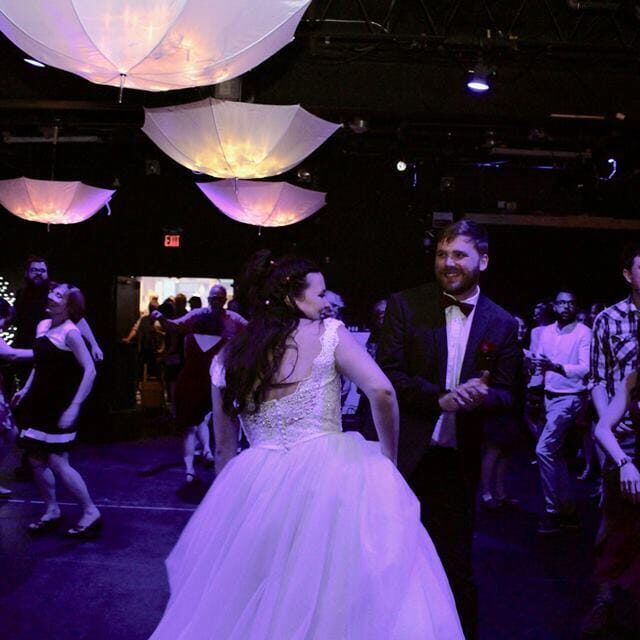 BusStopTheatre_AmyMcConchie In this image: people dancing at a wedding reception.