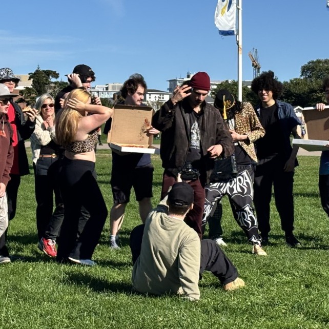 Halifax rapper, Kyle Folk Roche, and friends shooting a music video at the Halifax Common on Oct. 4, 2026 (Mia Phillips/ The Dalhousie Gazette)