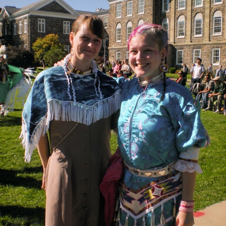 Emerald and Marrinna Wells show-off their regalia. (Photo by Karin Murray-Bergquist)