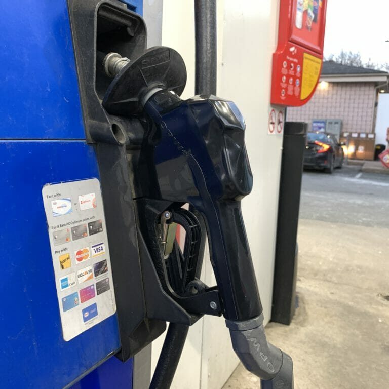 In this image: A gas pump nozzle.