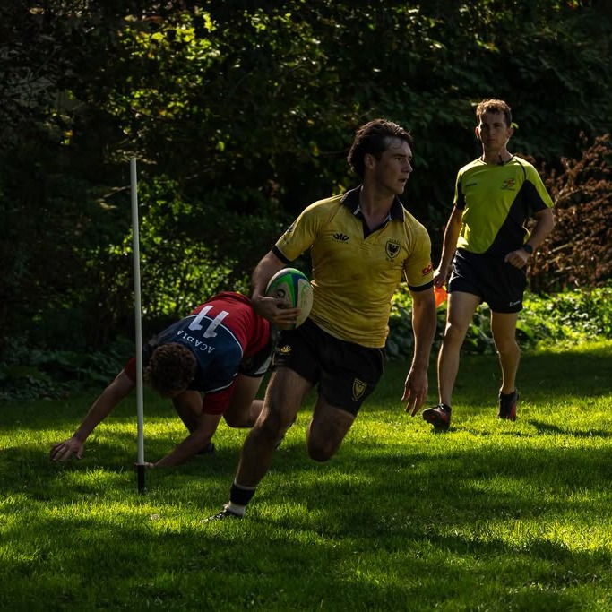 Charles Hughes walks into the try zone uncontested during a rugby match at St. Francis Xavier Ball Field in Antigonish, on Oct. 3, 2026. (Ian Seckler/The Dalhousie Gazette)