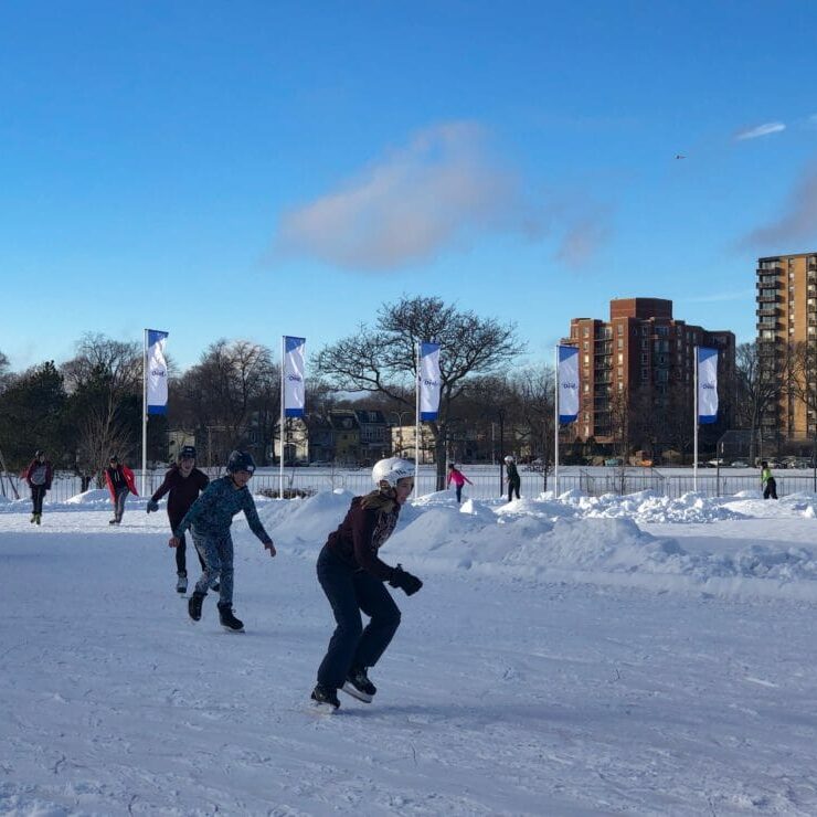 In this image: skaters on the Emera Oval.