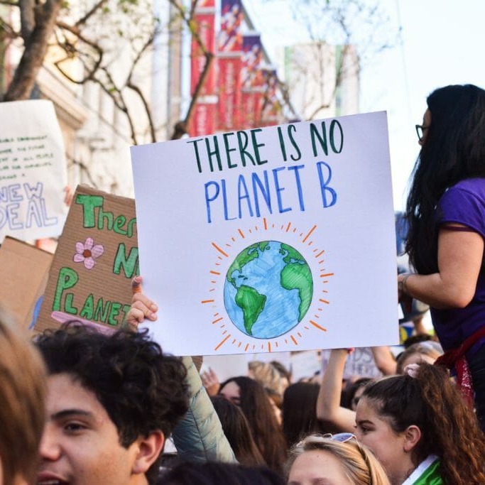 ElectionsCanada In this image: A rally with a sign saying "there is no planet B."