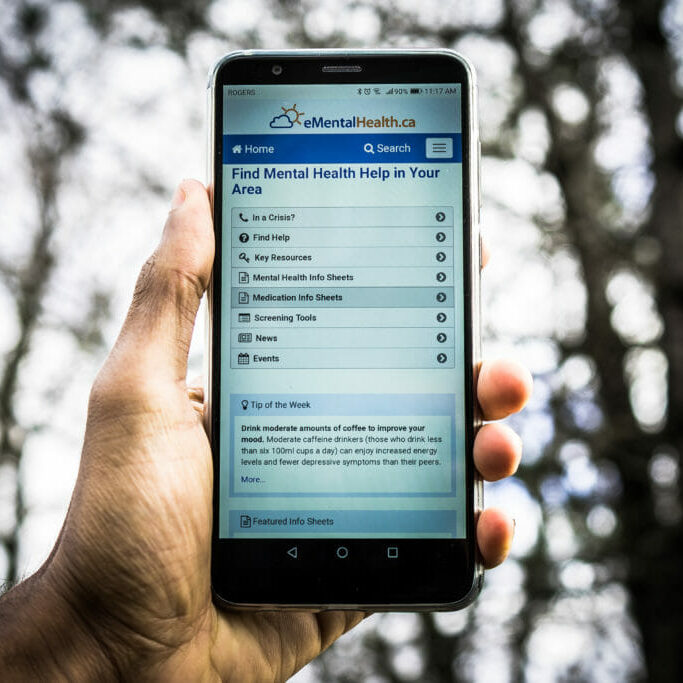 In this image: a phone on the eMentalHealth page.