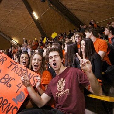 Trojans fans cheer on their team. Photo by Alice Hebb