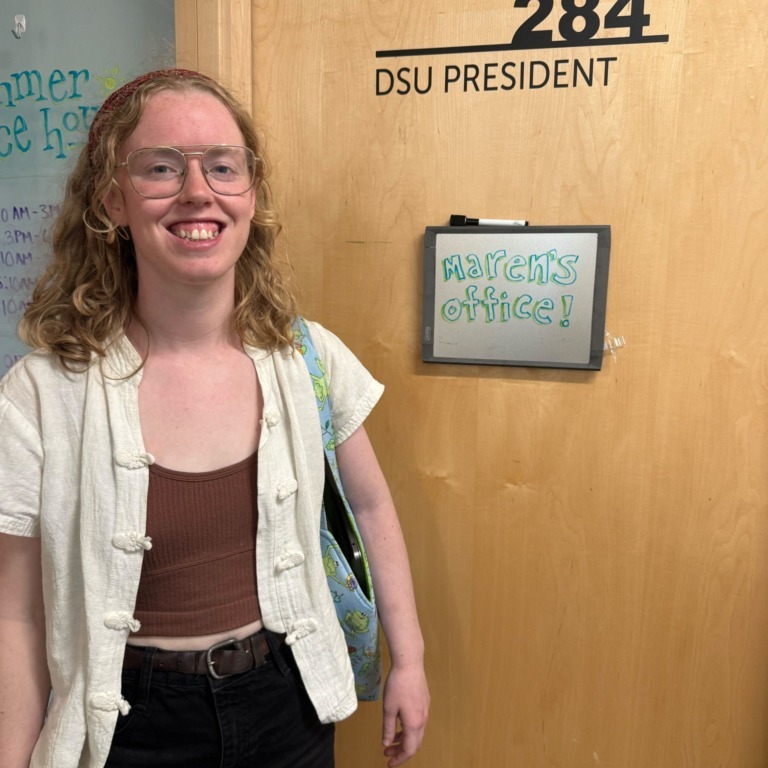 Dalhousie Student Union president Maren Mealy, for the 2025/2026 school year, stands in front of her office in the Student Union Building in Halifax, Nova Scotia, on Thursday, Aug. 28, 2025. (Jonas May/The Dalhousie Gazette)