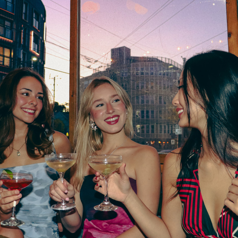 Friends enjoy drinks at The Local in Halifax, Nova Scotia. (Rachel Bass/The Dalhousie Gazette)