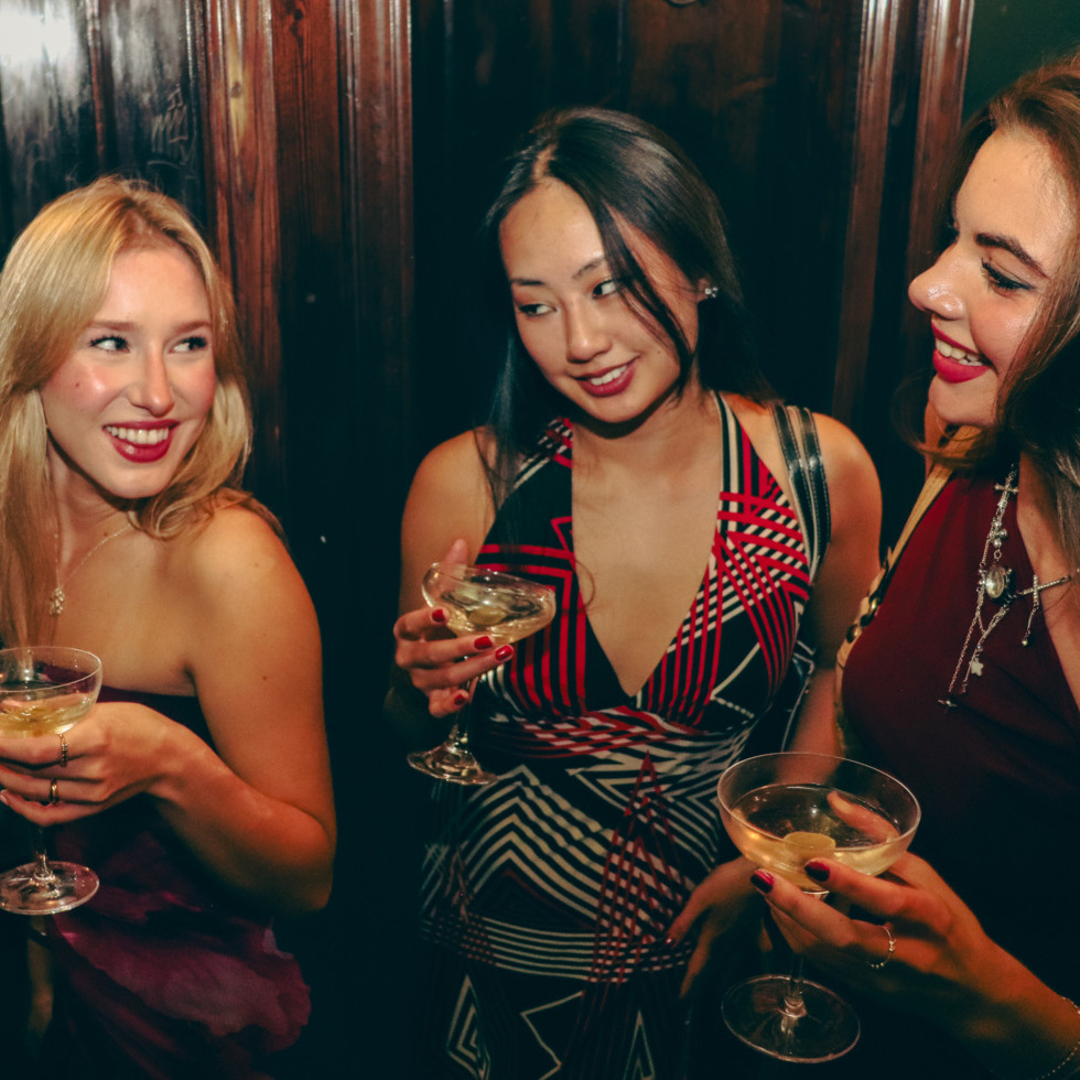 Dalhousie Gazette columnist Hannah Nekkers chats with friends at the Local in Halifax, Nova Scotia. (Rachel Bass/The Dalhousie Gazette)