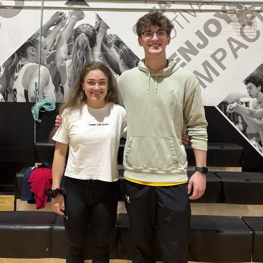 Ana Kahlhammer and Max Mitchell, new additions to the Dalhousie Tigers, pose on a basketball court at the Dalplex in Halifax, Nova Scotia, on Friday, Sept. 5, 2025. (Dylan Buckman/The Dalhousie Gazette)