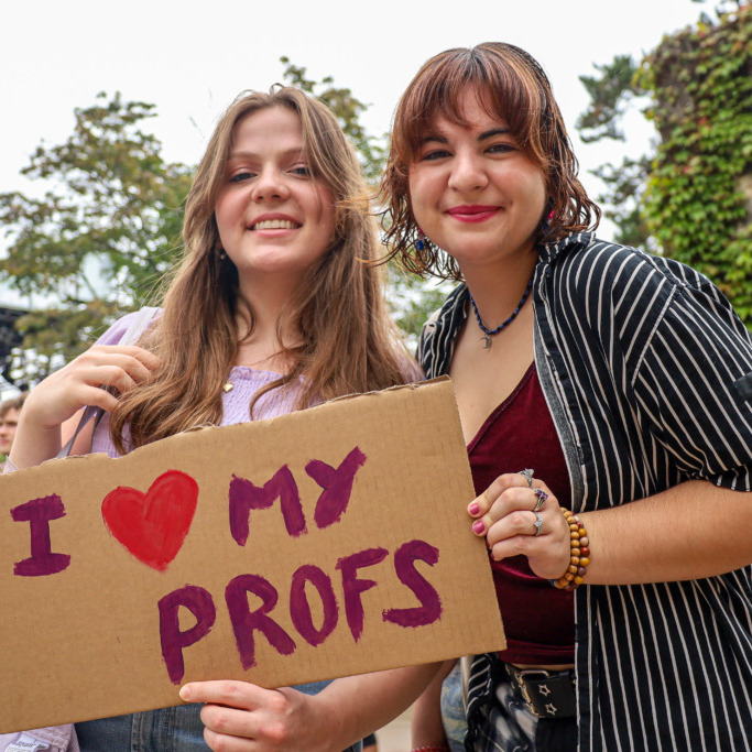Two Dalhousie University students attend a rally in support of locked-out faculty on Dalhousie campus in Halifax, NS on Friday, Sept. 5, 2025. (Jenna Olsen/The Dalhousie Gazette) 