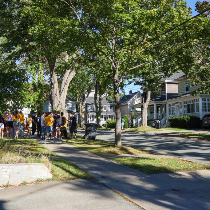 A group of students gather on Jennings Street in Halifax, Nova Scotia, on Saturday, Sept. 27, 2025. (Jenna Olsen/Dal Gazette)