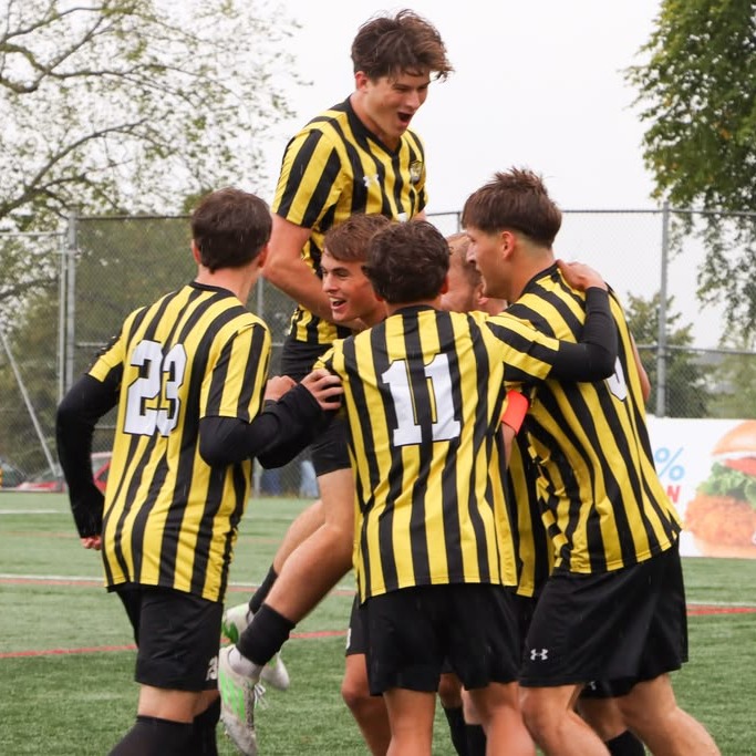 Dalhousie University’s men's soccer players celebrate after scoring the opening goal of the game at Wickwire Field in Halifax, Nova Scotia, on Sept. 6, 2026. (Lukas Kohler/The Dalhousie Gazette)