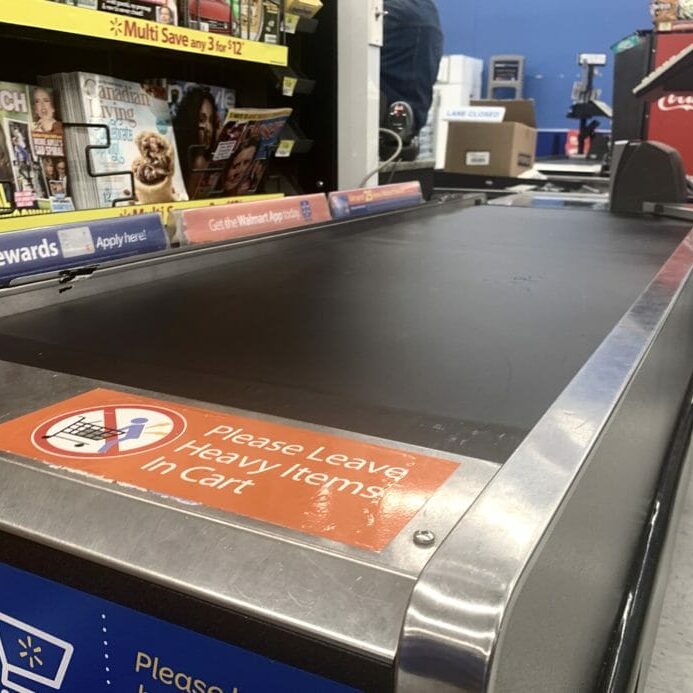In this image: A grocery store conveyor belt.