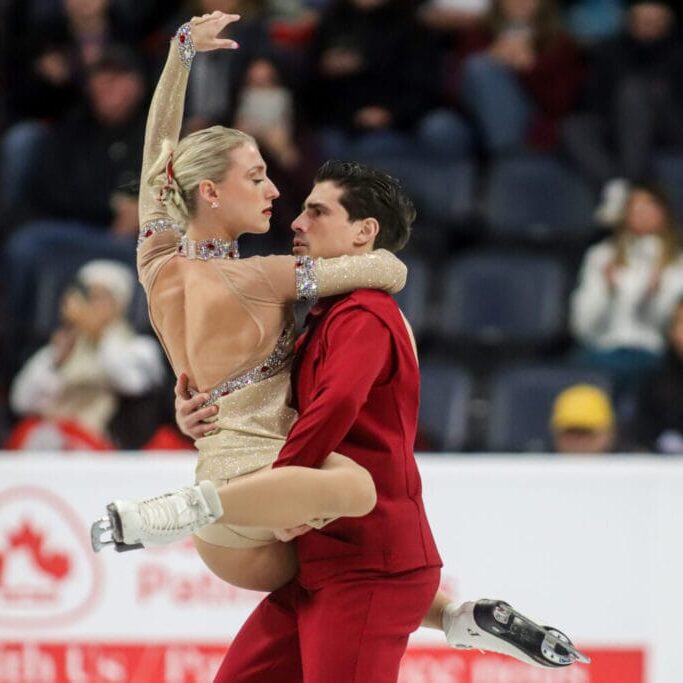Canadian ice dancers Piper Gilles (L) and Paul Poirier (R) perform a double-stag spin in the ice dance free program at the 2024 Skate Canada International in Halifax, Nova Scotia on Sunday, Oct. 27, 2024. Gilles and Poirier placed first overall securing their fifth consecutive Skate Canada International title.  (Image by Jenna Olsen)