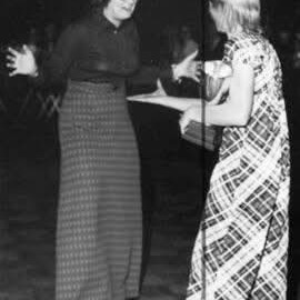 Emily Wainwright presents the basketball MVP award to Judi Rice in 1974. (Image courtesy of Dalhousie University Photograph Collection)


