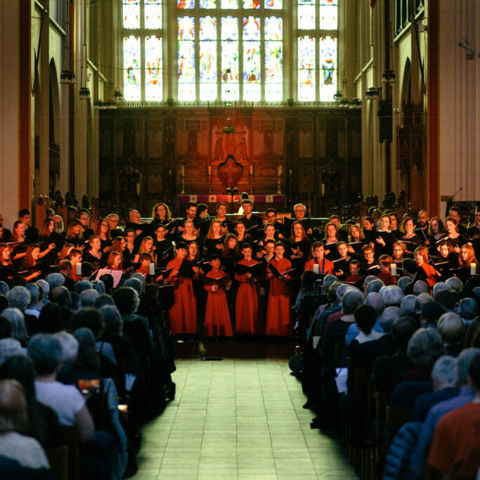 In this image: The King's Chorus performing at St. Mary's Basilica.