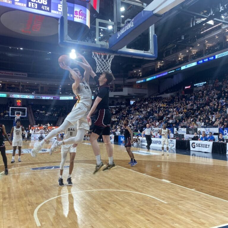 MBB SEMI_Ethan Hunt The Dal Tigers worked around SMU defenders, winning the game by 15 points to move on to the semifinal. Image credit: Ethan Hunt