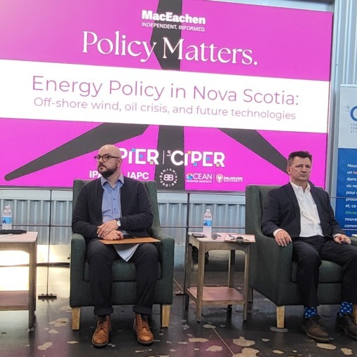 Panelists speak during the 