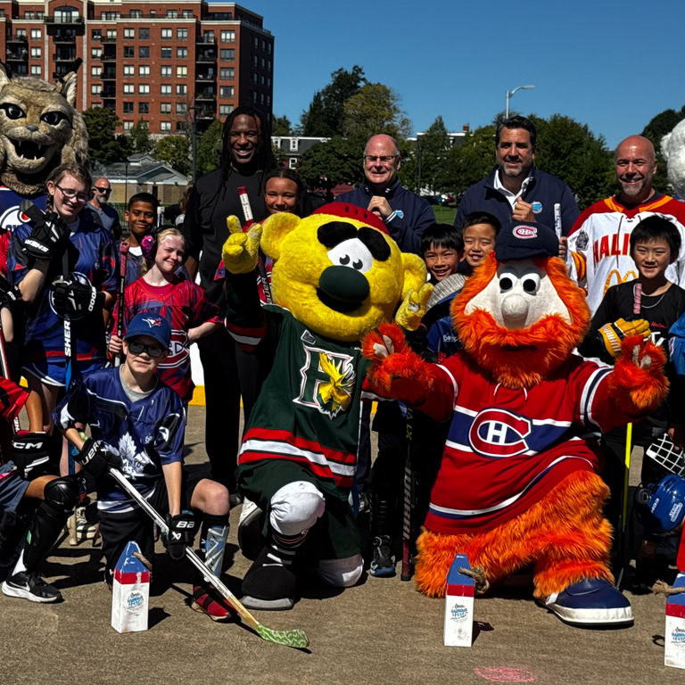 Children pose with mascots at the NHL Harbour Fest at the Emera Oval in Halifax, Nova Scotia, on Sept. 12, 2026. (Ryan Bradbury/The Dalhousie Gazette)
