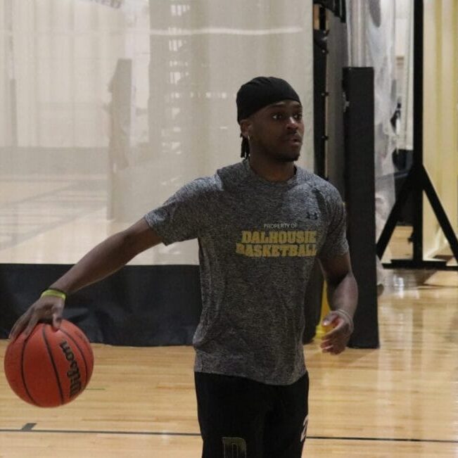 Ngala practicing on the court. Image credit: Ethan Hunt