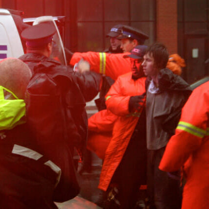 Occupy NS - 29 An arrested demonstrator about to enter the police van.