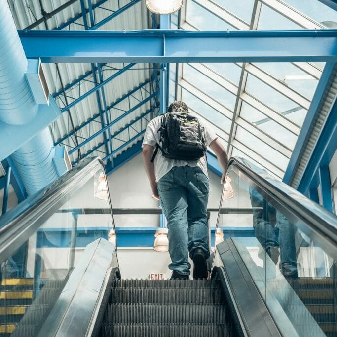 escalator student