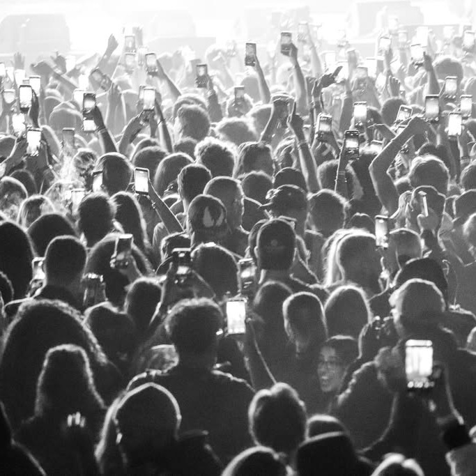 Concertgoers record the performance on their phones during Magnetic World on Citadel Hill in Halifax, on Sept. 25, 2026. (Rachel Bass/The Dalhousie Gazette)

