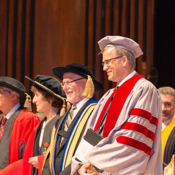 President Richard Florizone, foreground, is joined by his predecessor Tom Traves at the induction ceremony of Dalhousie's 11th president earlier this month.
