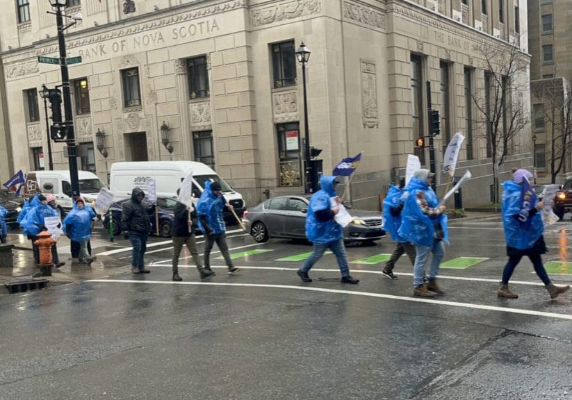 Correctional officers protest for better pay in front of the Justice Department on Thursday, Dec. 5, 2024. Image by Emma Breton