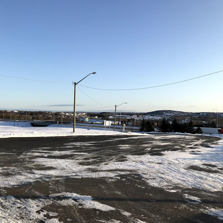 In this image: A road in Woodstock, N.B.