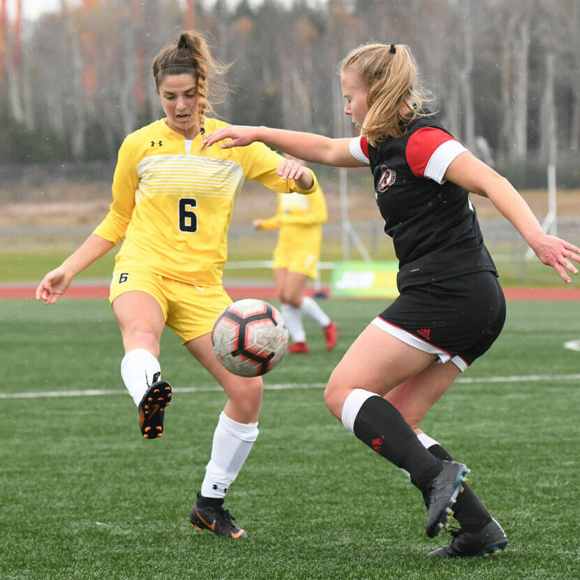 In this image: Two players during the Dalhousie versus University of New Brunswick game on Oct. 31.