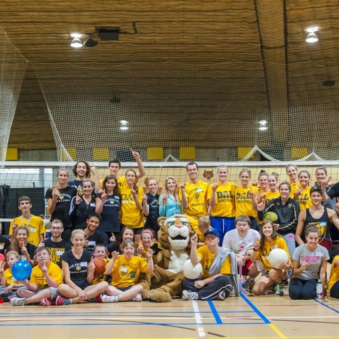 Kids and coaches posing after a fun afternoon (photo by Chris Parent)