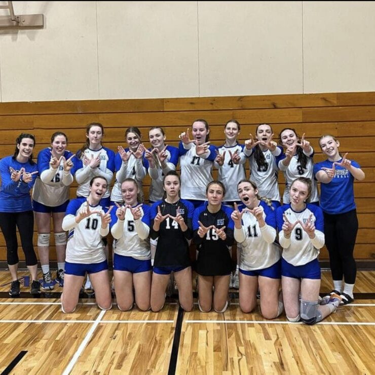 The UKC women's volleyball team after their first win of the season. Image Credit: UKC women's volleyball on Instagram