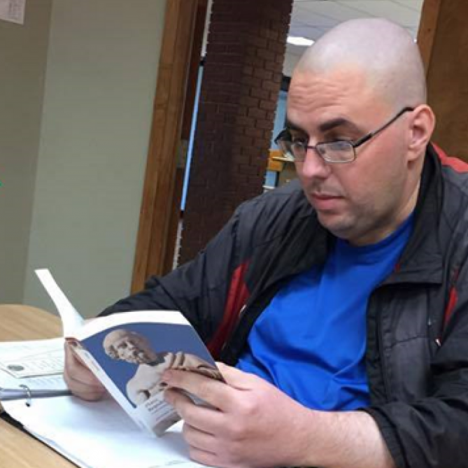 Halifax Humanities 101 student Tim Blades reads Plato’s Republic before class.