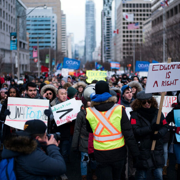 In this image: a protest against the Ford Government in Ontario.