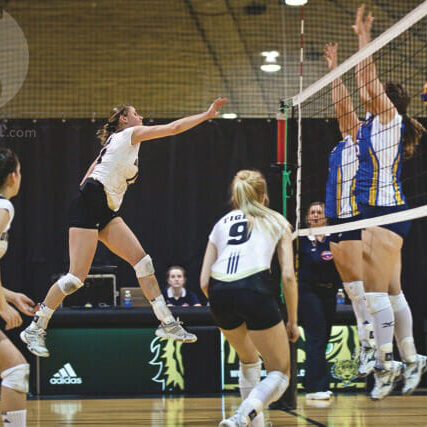 Player of the game Louise Facca punches the ball past Moncton's blockers. Photo by Pau Balite