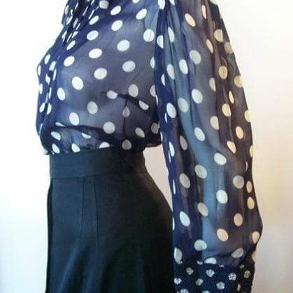Vintage polka-dot blouse provided by rose, found at swingfashionista.com