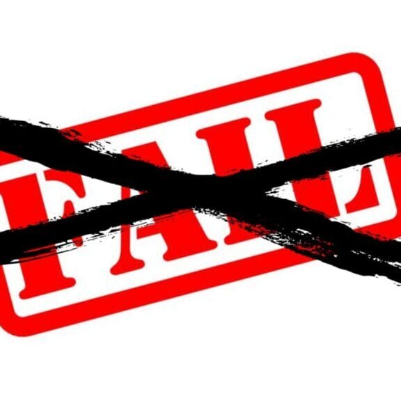 Image of crossing out a fail with an X

