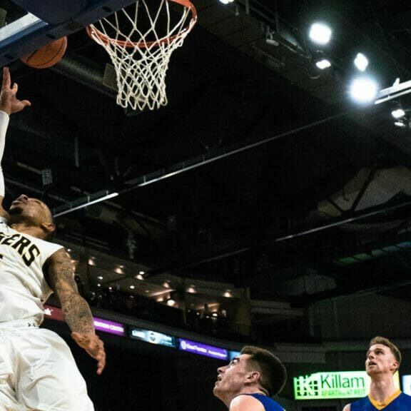 Xavier Ochu In this image: Xavier Ochu scoring a layup.