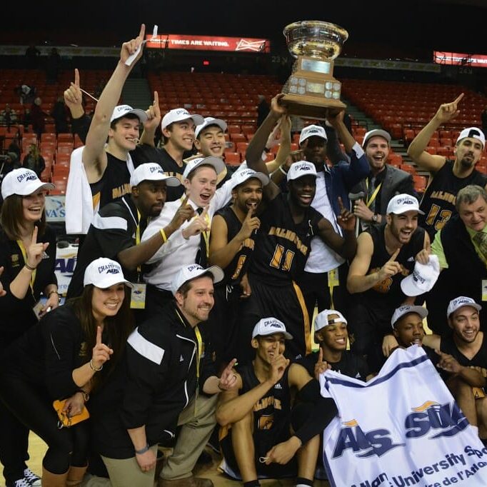 The Tigers celebrate in March after winning their first AUS championship since 2011. (Photo: Jennifer Gosnell)