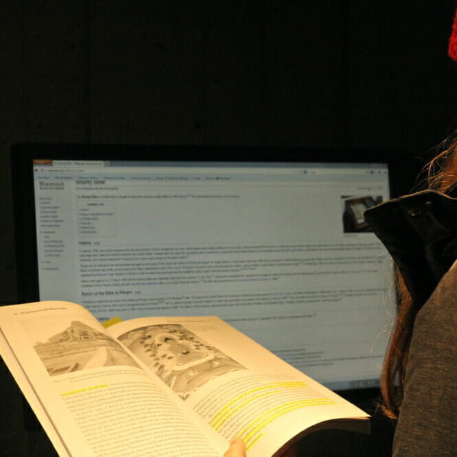 Print books offer an intensely physical interaction—useful when reading for school. (Photo by Deborah Oomen)