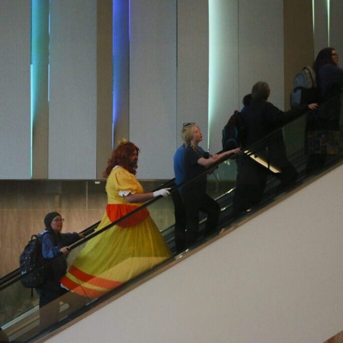 Weekend pass holders enter the Halifax Convention Centre on Saturday, Nov. 9, 2024 in Halifax, Nova Scotia. Hal-Con goers usually plan out multiple cosplay looks to wear throughout the con. Image by Ferris Kerr.