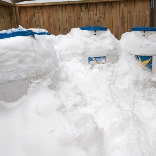 Oil tanks covered in snow.