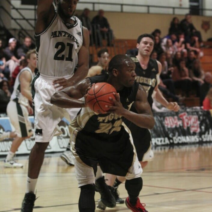 Kashrell Lawrence (22) looks for an opening against the high-flying Panthers. (Photo by Shauna Brown) Kashrell Lawrence (22) looks for an opening against the high-flying Panthers. (Photo by Shauna Brown)