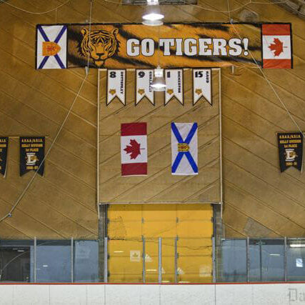 Four banners hang from the Memorial wall. Dal has yet to retire any numbers. Photo by Pau Balite
