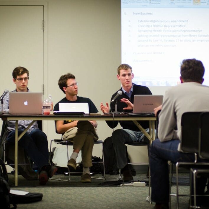 Ben Wedge, Jamie Arron and Aaron Wolfe take questions at the DSU AGM. (Calum Agnew photo)
