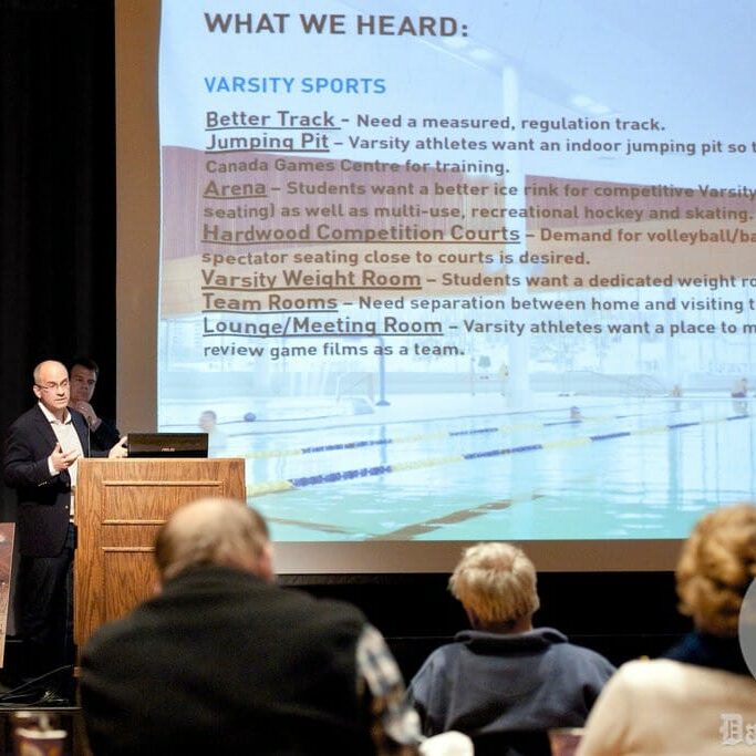Oliver Beck of Educational Consulting Services speaks to the gathered audience. (Chris Parent photo)